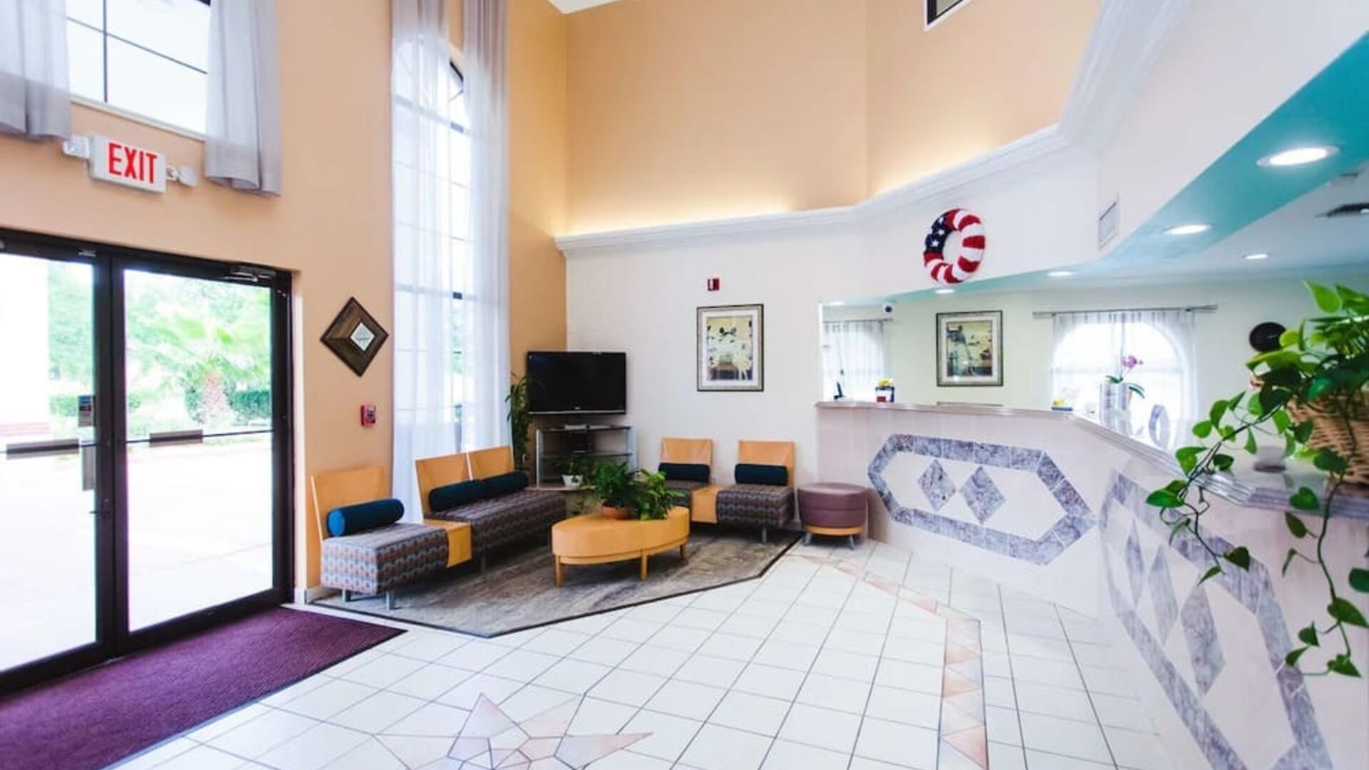 Lobby and coworking lounge at Best Western Pearland Inn.