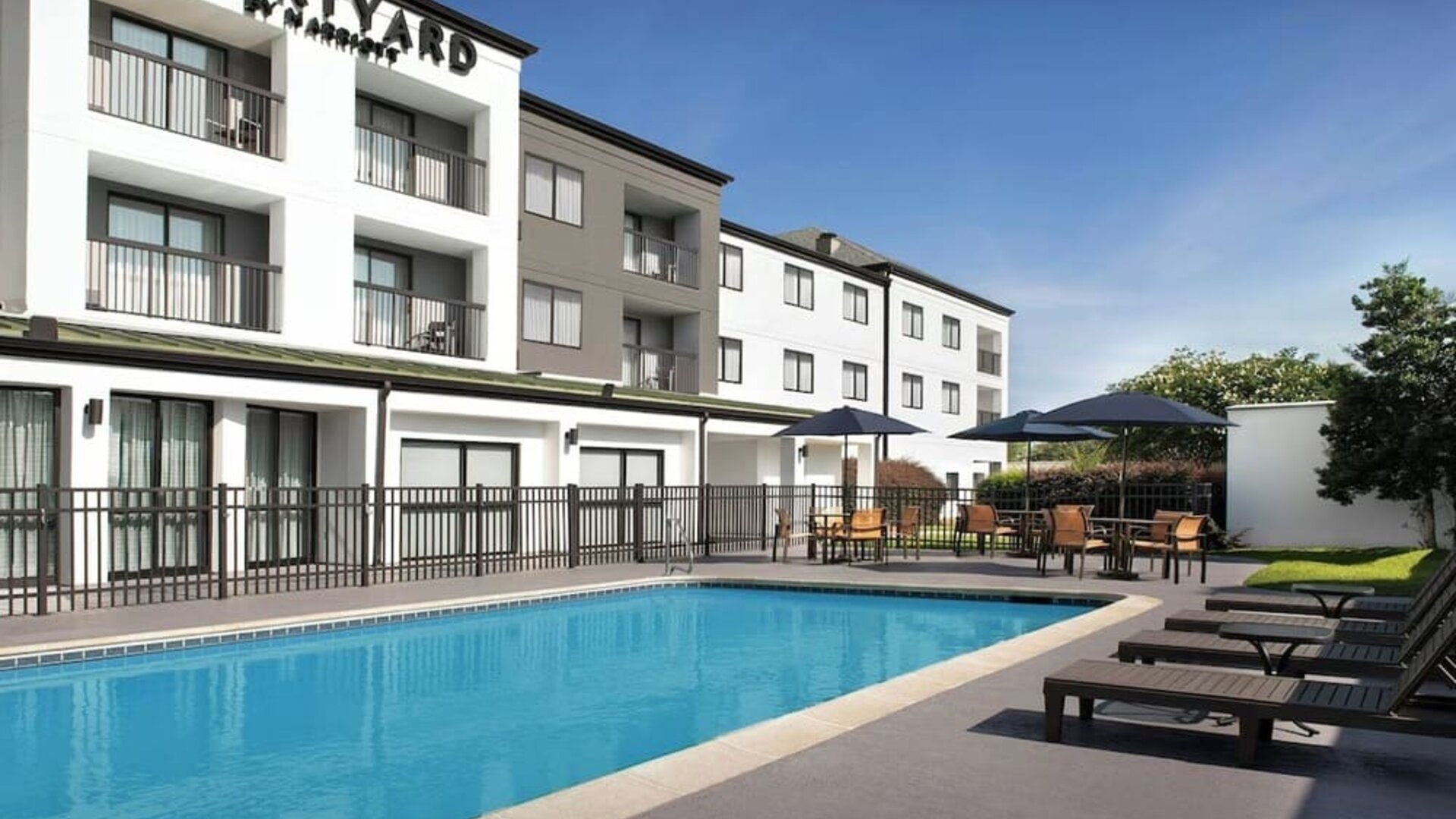 Refreshing outdoor pool at Courtyard By Marriott Hattiesburg.