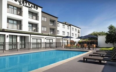 Refreshing outdoor pool at Courtyard By Marriott Hattiesburg.
