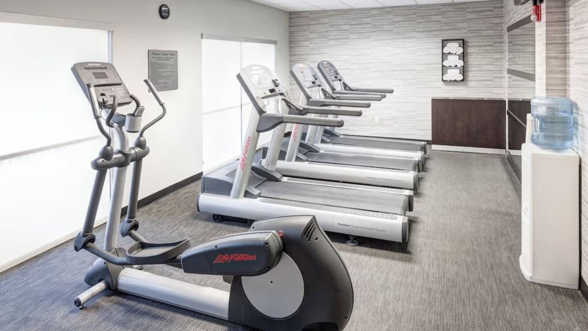 Fitness center at Courtyard By Marriott Hattiesburg.