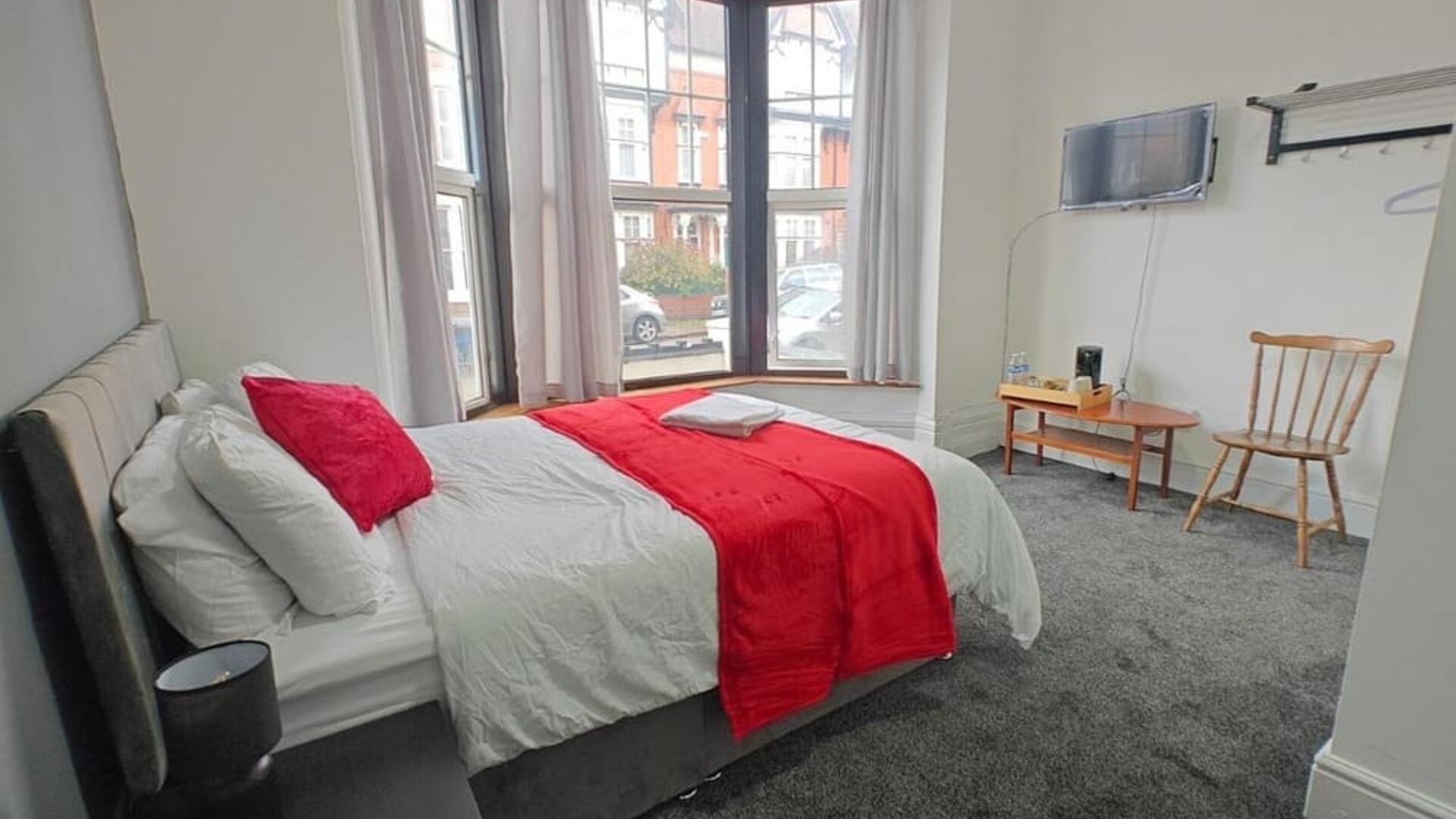 Bright and spacious day use room with work desk at Campbell Guest House Hotel.