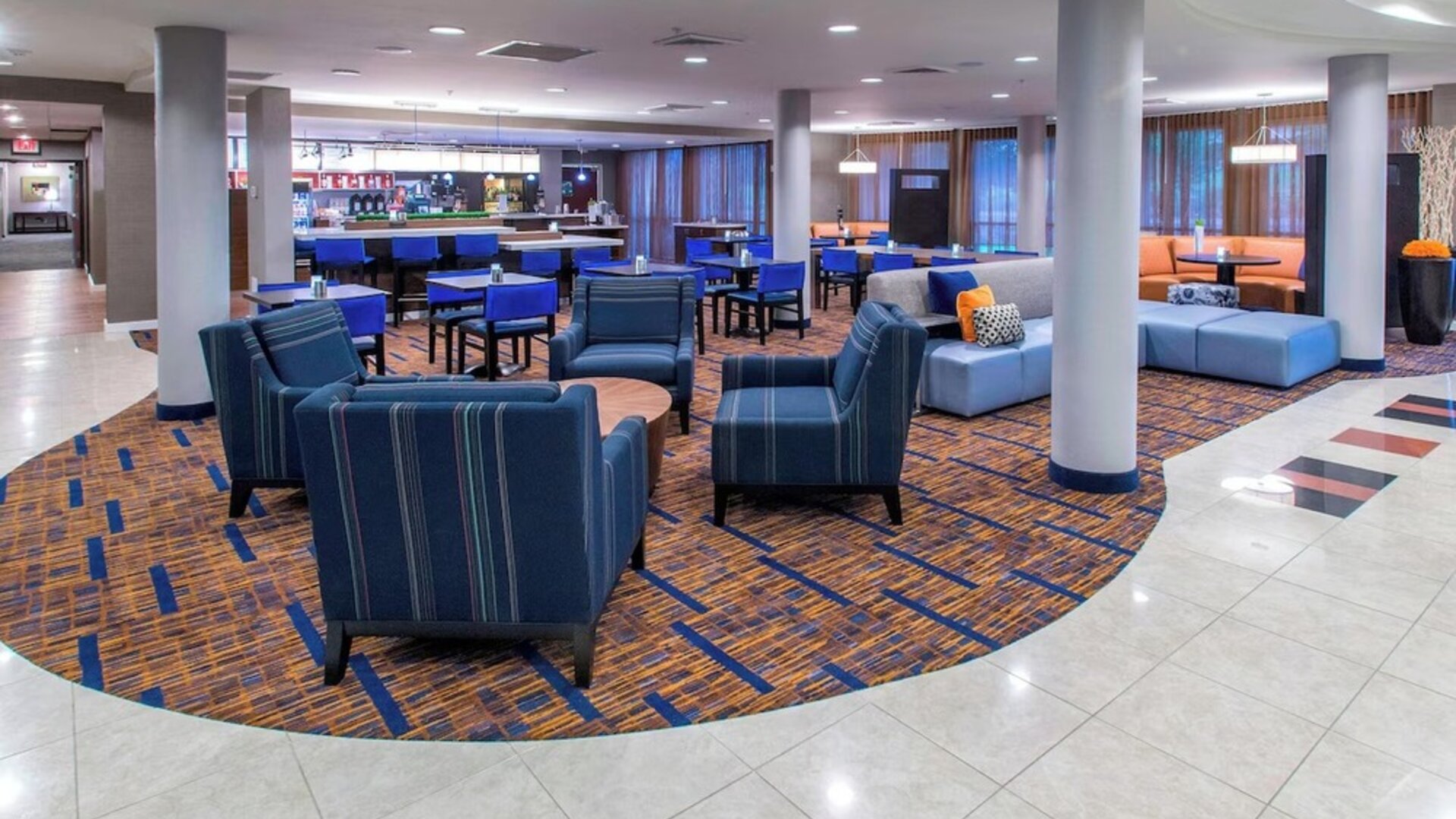 Lobby and coworking lounge at Courtyard By Marriott Montgomery Prattville.