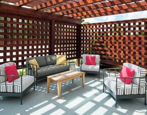 Outdoor furniture perfect for coworking at Fairfield Inn & Suites By Marriott Houston Pasadena.