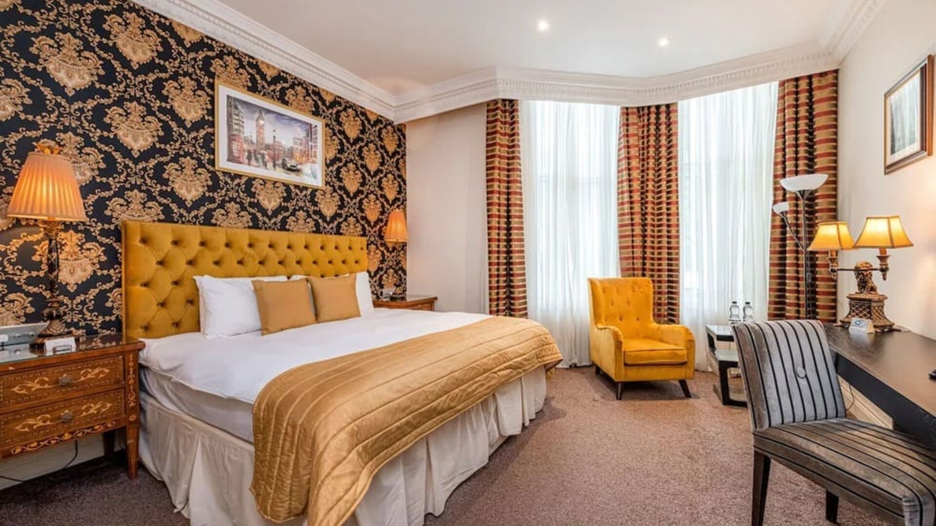 Day use king room with work desk and lounge area at Ashburn Hotel.