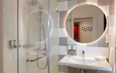 Guest bathroom at Hampton By Hilton Budapest City Centre.