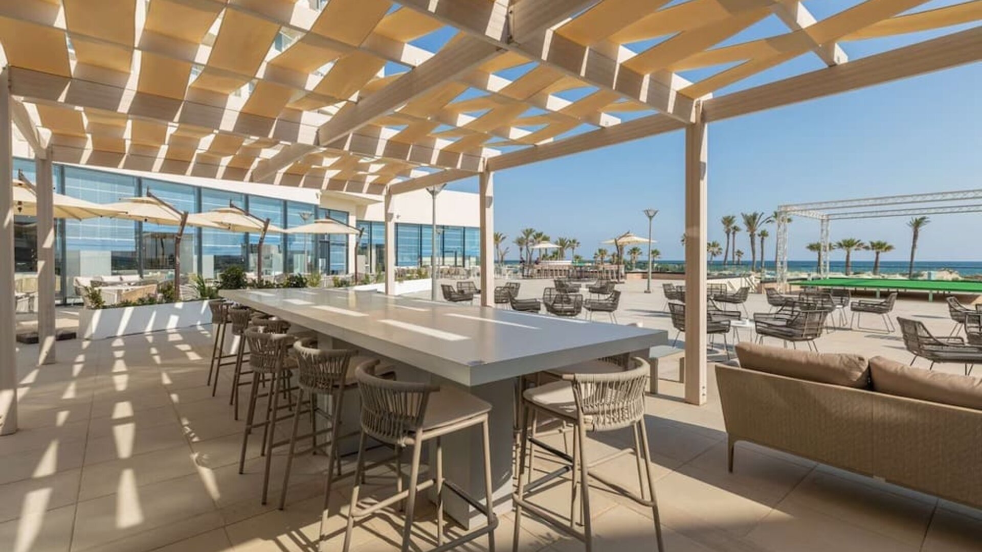 Outdoor seating at Hilton Skanes Monastir Beach Resort.