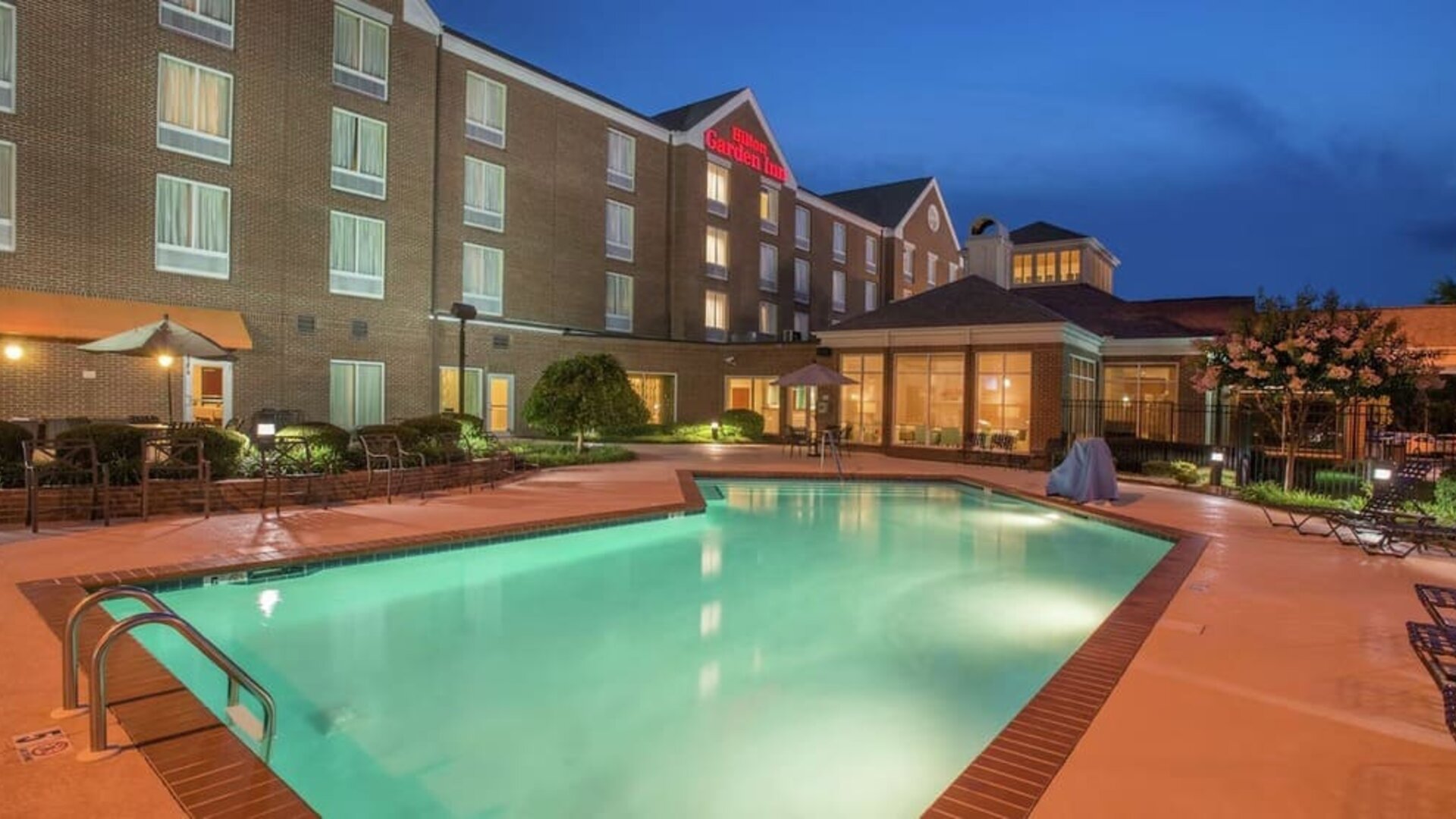 Refreshing outdoor pool at Hilton Garden Inn Macon / Mercer University.
