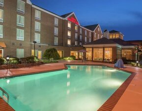 Refreshing outdoor pool at Hilton Garden Inn Macon / Mercer University.
