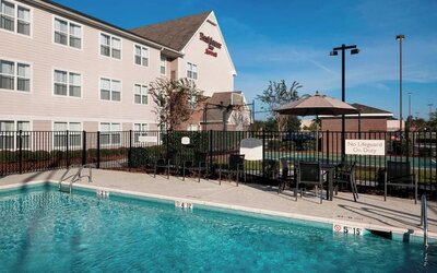 Refreshing outdoor pool at Residence Inn By Marriott Hattiesburg.