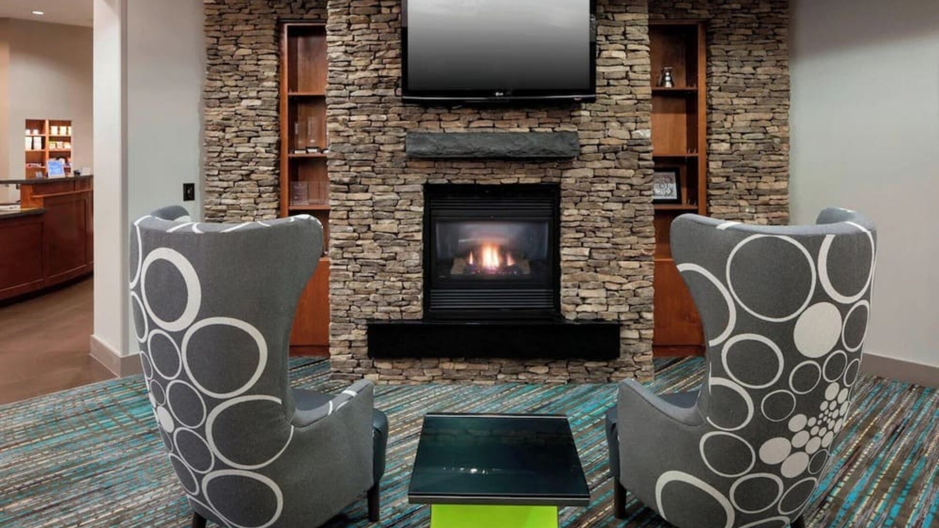 Lobby and coworking lounge at Residence Inn By Marriott Hattiesburg.