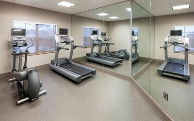 Fitness center at Residence Inn By Marriott Hattiesburg.