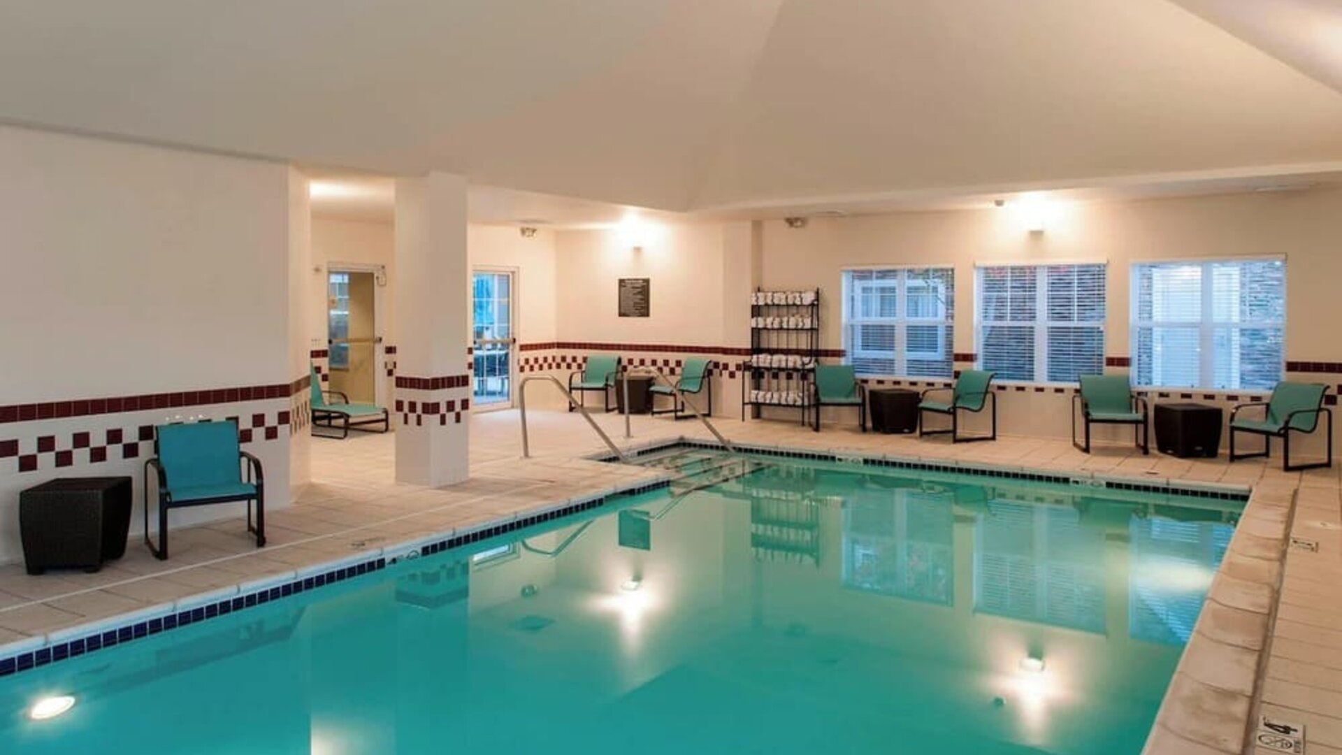 Refreshing indoor pool at Residence Inn By Marriott Bentonville Rogers.