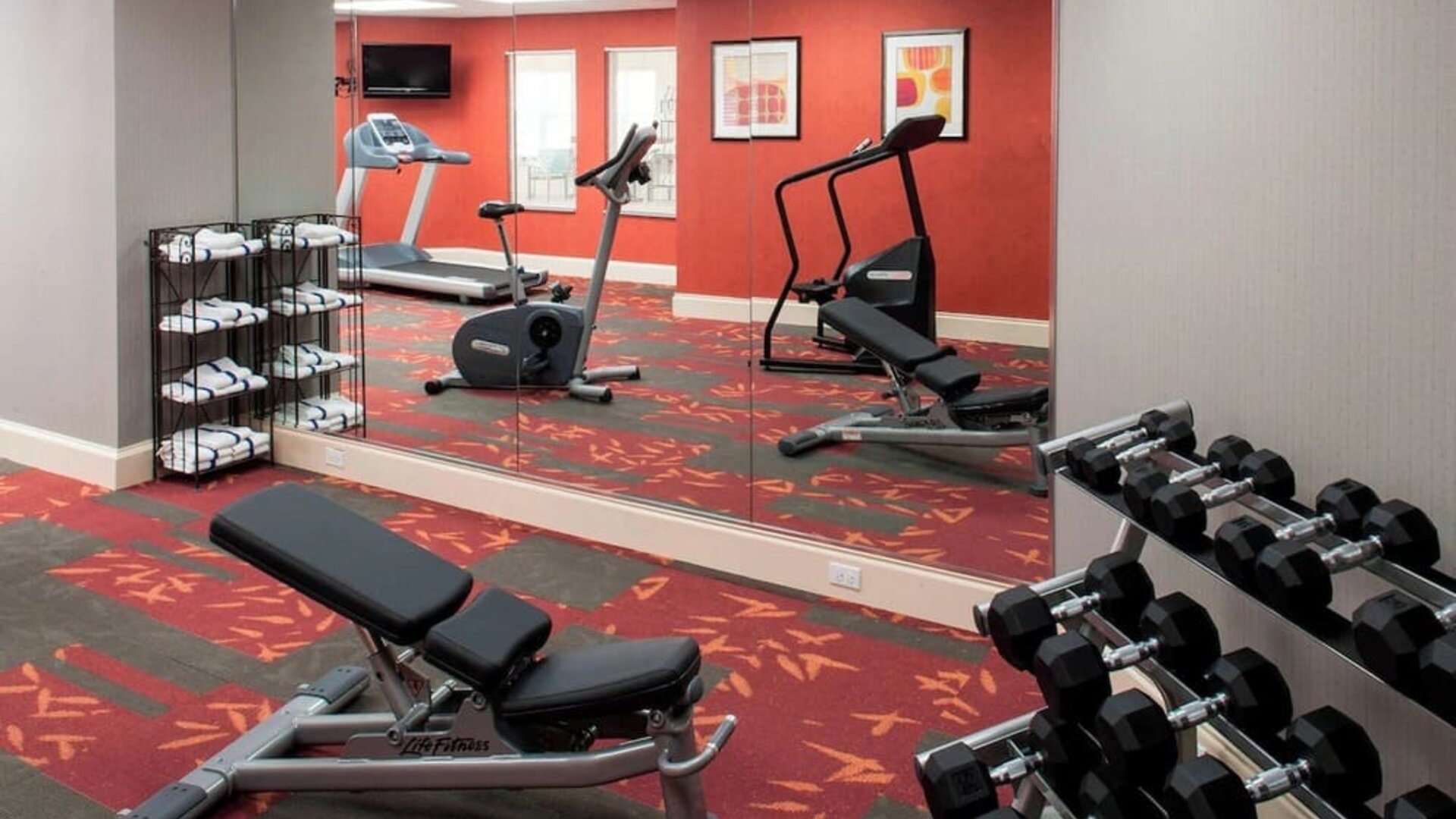Fitness center at Residence Inn By Marriott Bentonville Rogers.