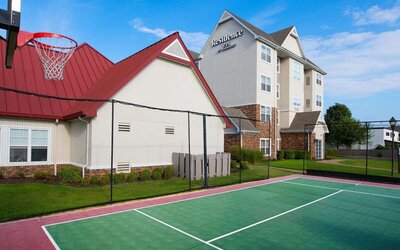 Tennis and basketball court available at Residence Inn By Marriott Bentonville Rogers.