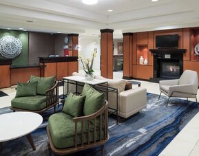 Lobby and coworking lounge at Fairfield Inn & Suites Kansas City Overland Park.