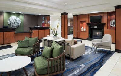 Lobby and coworking lounge at Fairfield Inn & Suites Kansas City Overland Park.