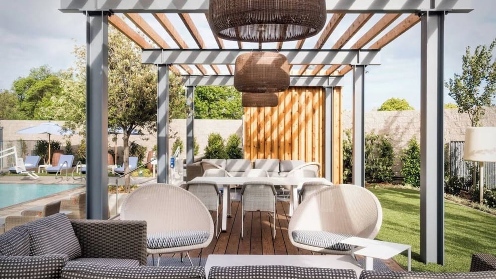 Cabanas beside the pool at Hotel Nia, Autograph Collection.