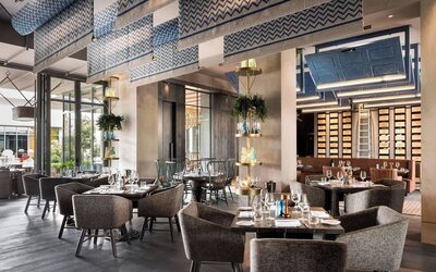 Dining area perfect for coworking at Hotel Nia, Autograph Collection.