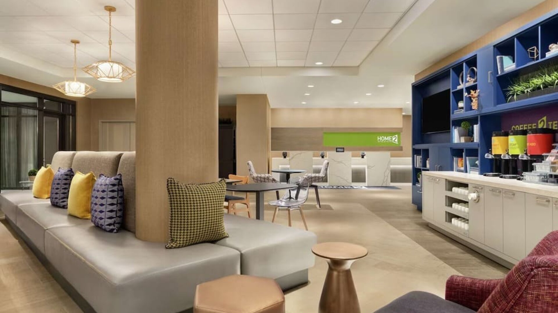 Lobby and coworking lounge at Home2 Suites By Hilton Chicago River North.
