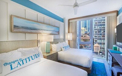 Day room with queen beds at Margaritaville Resort Times Square.