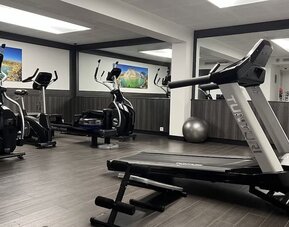 Fitness center at DoubleTree By Hilton Paris Bougival.