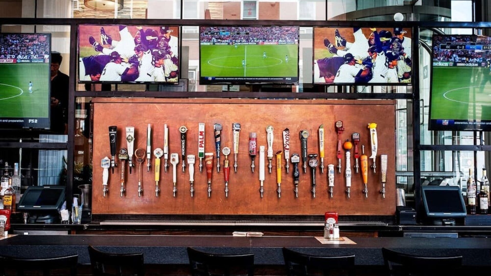 Hotel bar TV at Wyndham Garden Chinatown NYC.