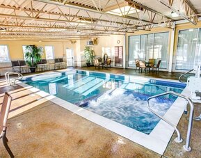 Refreshing indoor pool at Comfort Inn & Suites Triadelphia.