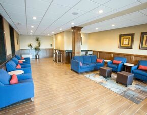 Lobby and coworking lounge at Comfort Inn & Suites Triadelphia.