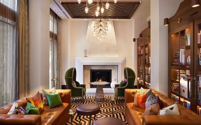 Lobby and coworking lounge at The Plaza Pioneer Park, El Paso.