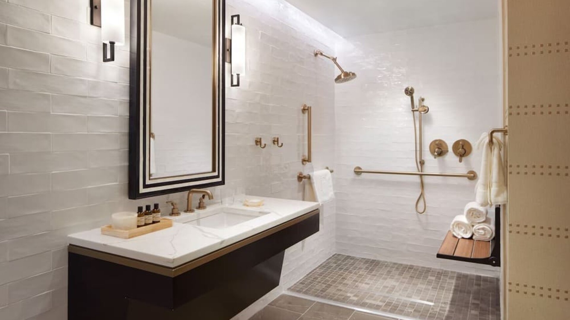 Guest bathroom with shower at The Plaza Pioneer Park, El Paso.