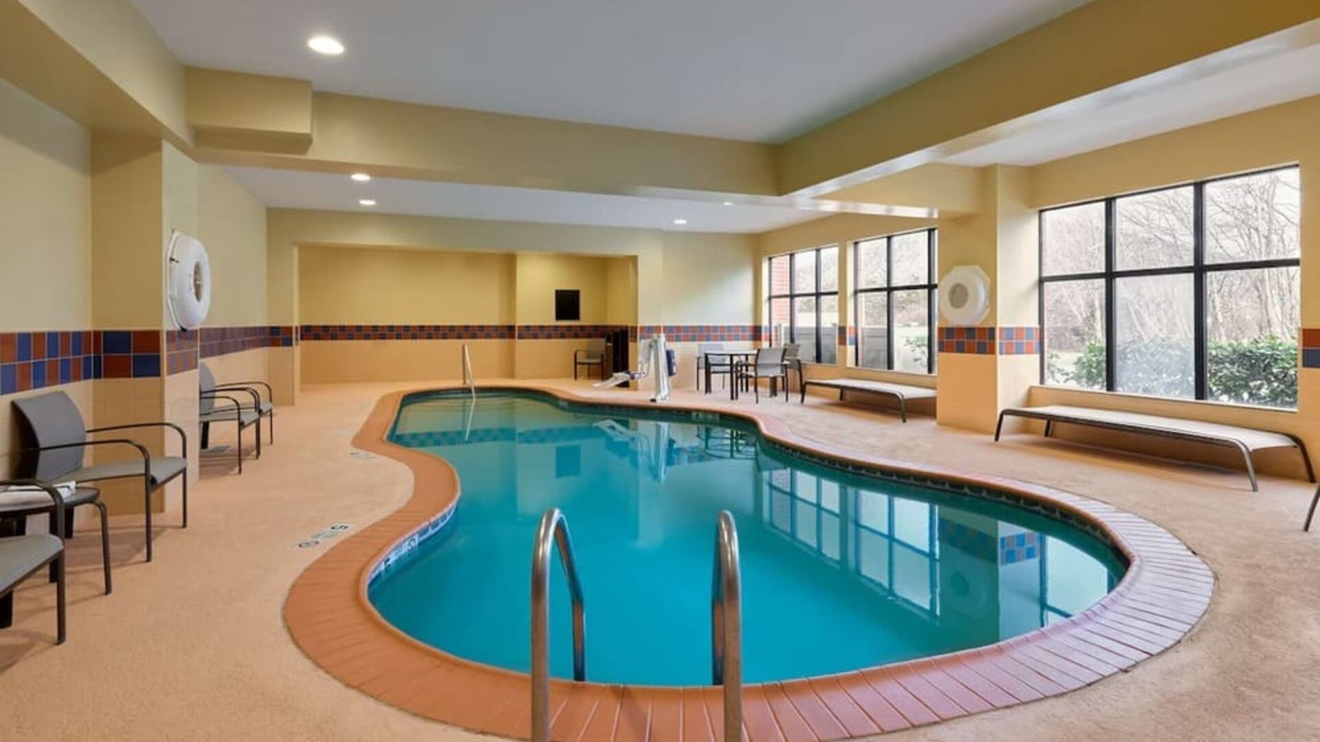 Refreshing indoor pool at Hampton Inn & Suites Providence/Smithfield.