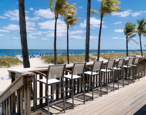 Sun deck with a view of the ocean at Plunge Beach Resort.