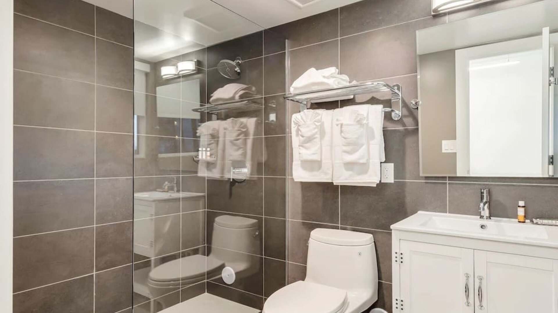 Guest bathroom with shower at Plunge Beach Resort.