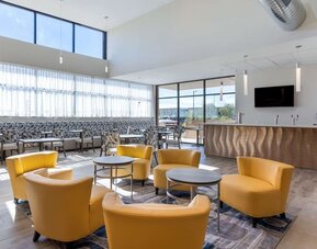 Bar and lounge area perfect for coworking at Best Western Plus Executive Residency Phoenix North Happy Valley.