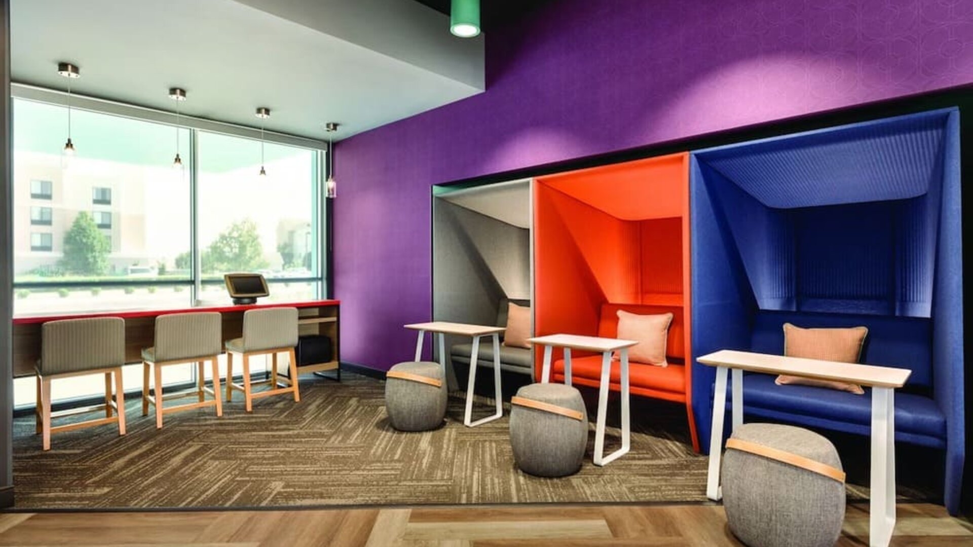 Comfortable working space with natural light at Tru By Hilton Wichita Northeast.
