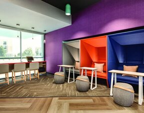 Comfortable working space with natural light at Tru By Hilton Wichita Northeast.
