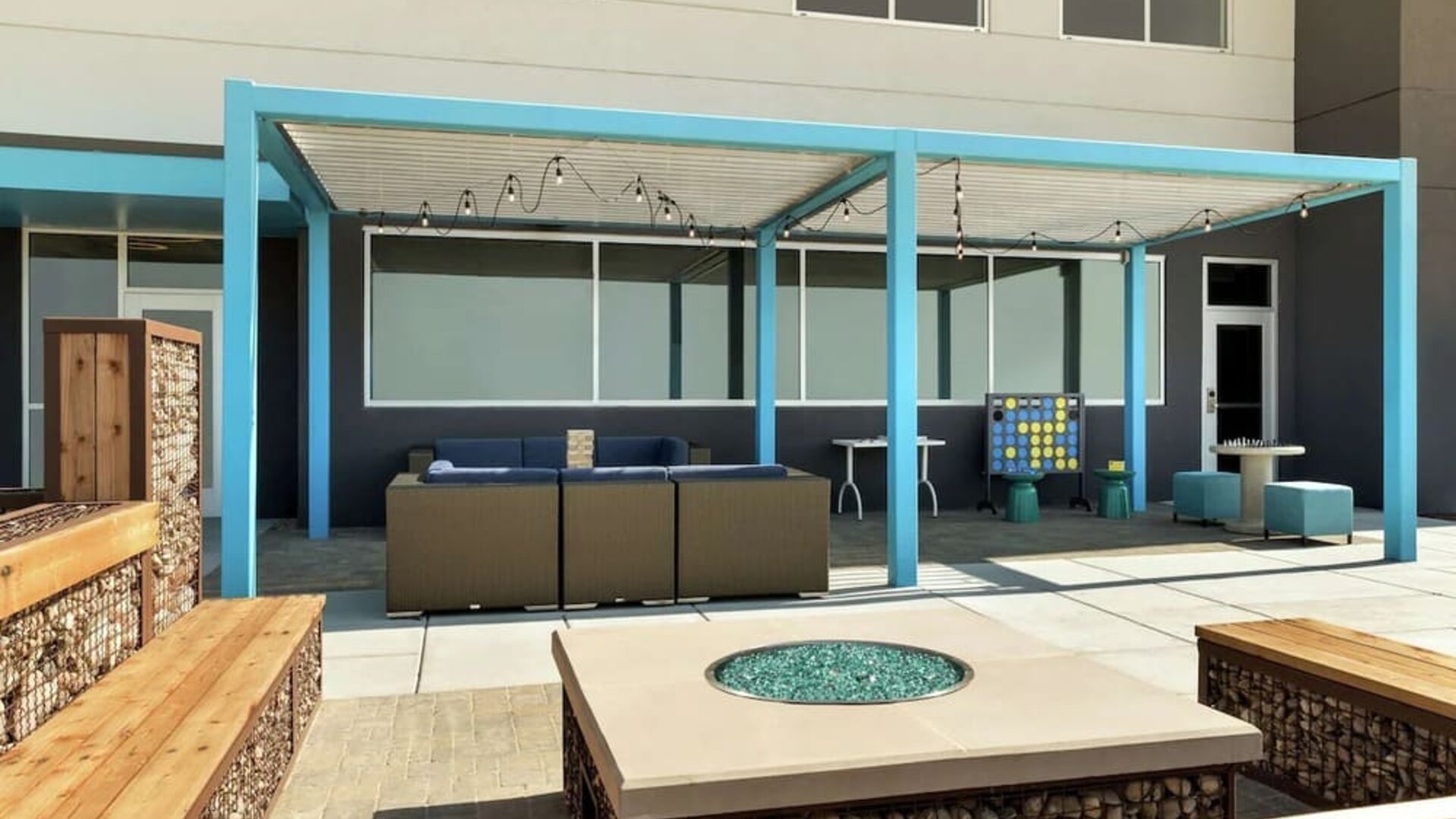 Comfortable patio perfect for coworking at Tru By Hilton Wichita Northeast.
