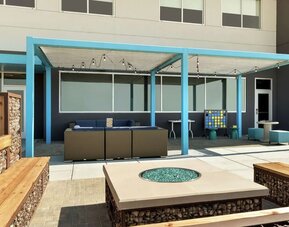 Comfortable patio perfect for coworking at Tru By Hilton Wichita Northeast.

