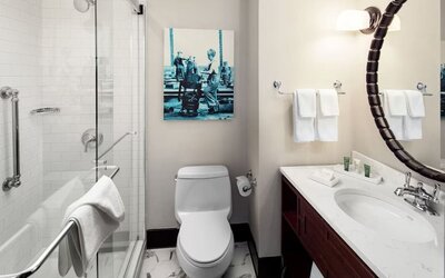 Guest bathroom with shower at Hilton Brooklyn New York.