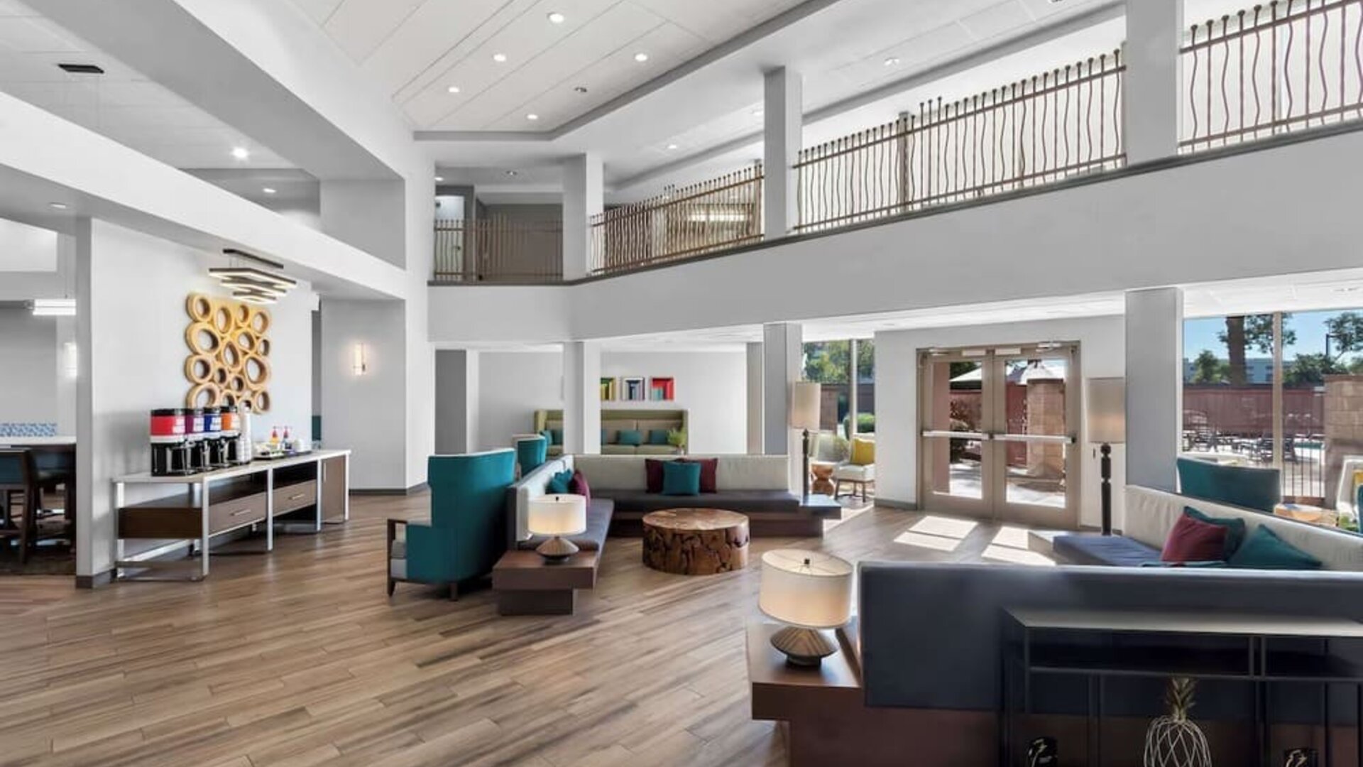 Lobby and coworking lounge at Hampton Inn & Suites Phoenix/Gilbert.