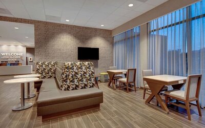 Lobby and coworking lounge at Hampton Inn & Suites Sunnyvale Silicon Valley.