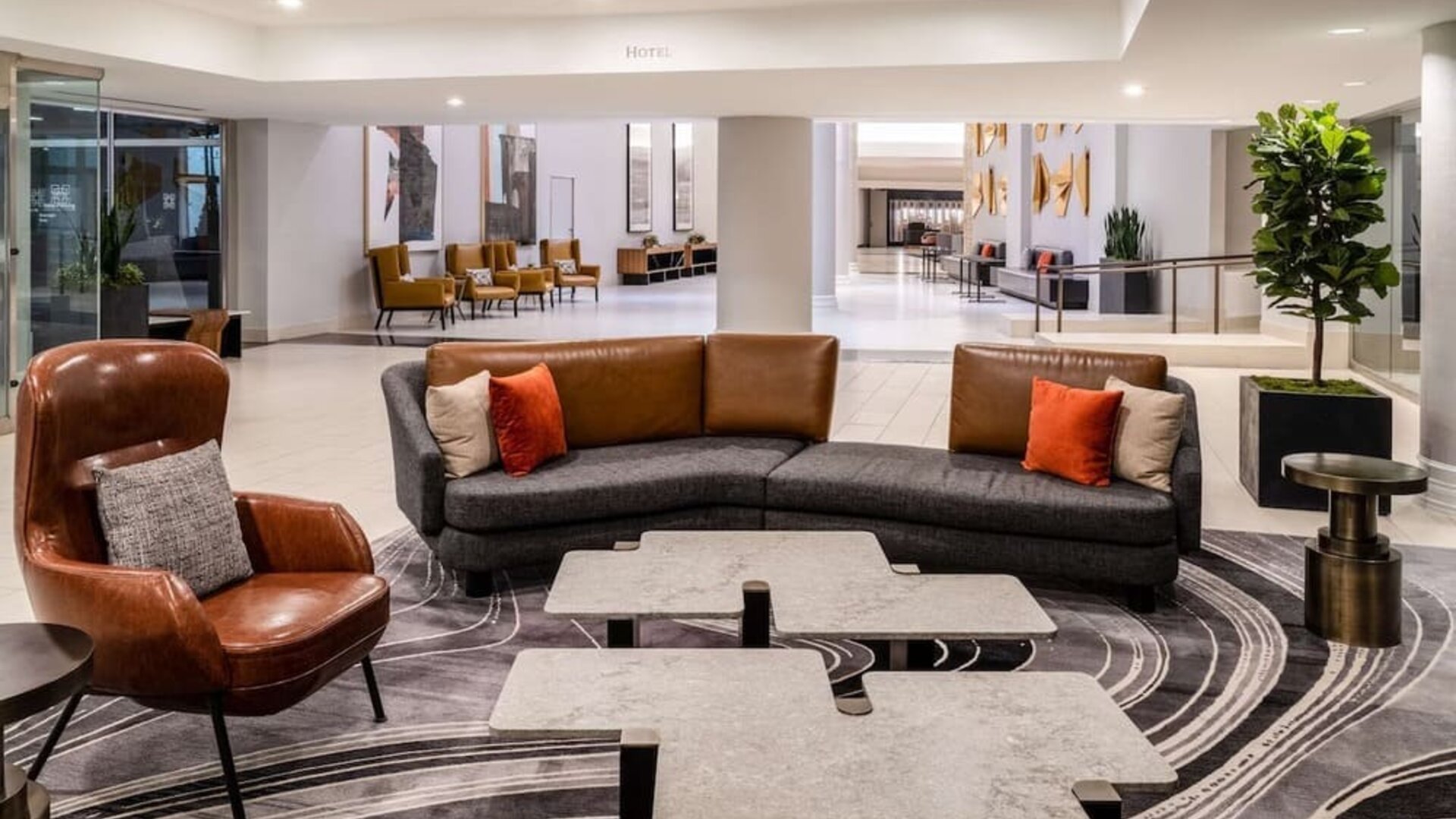 Lobby and coworking lounge at Hilton Dallas Lincoln Centre.