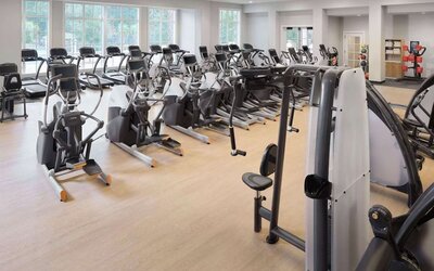 Well-equipped fitness center at Embassy Suites By Hilton Myrtle Beach Oceanfront Resort.
