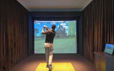 Golf simulators available at Embassy Suites By Hilton Myrtle Beach Oceanfront Resort.