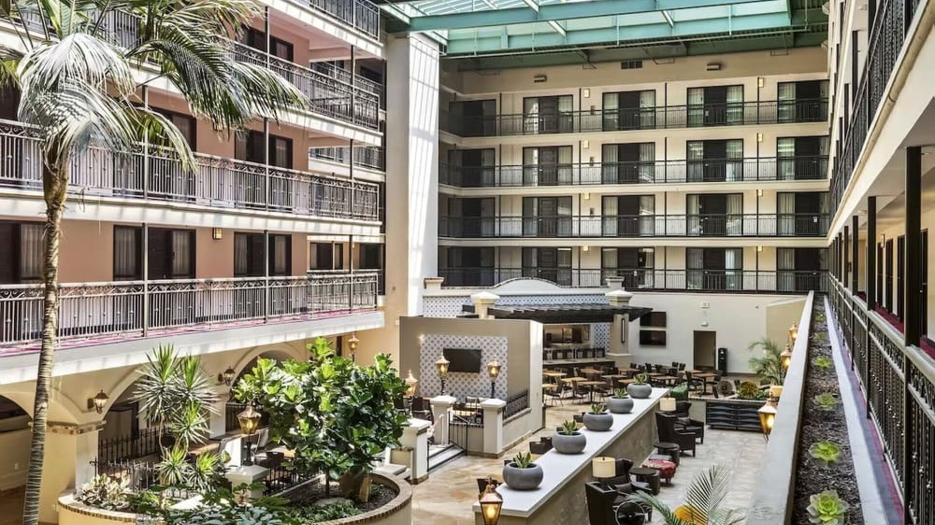 Lobby and coworking lounge at Embassy Suites By Hilton Los Angeles International Airport South.