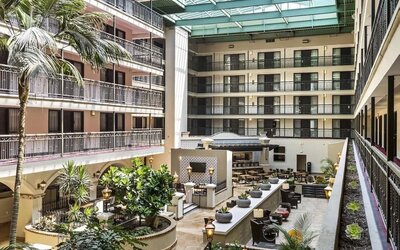 Lobby and coworking lounge at Embassy Suites By Hilton Los Angeles International Airport South.
