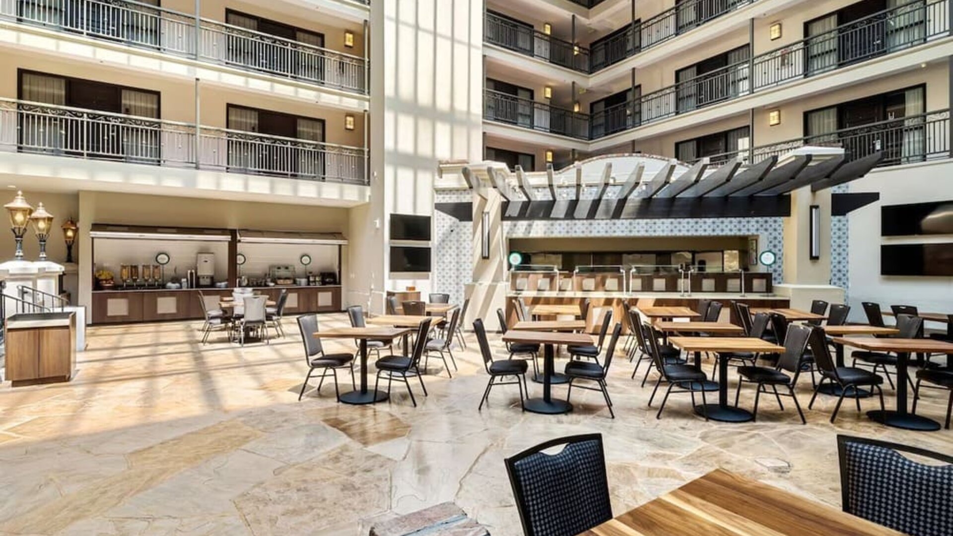 Dining area perfect for coworking at Embassy Suites By Hilton Los Angeles International Airport South.