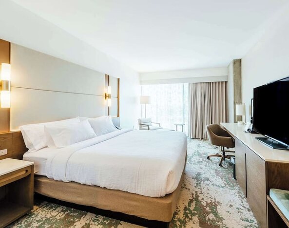 Day use room with work desk and natural light at Hilton Garden Inn Denver Union Station.

