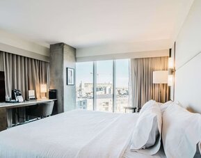 Day use room with work desk and natural light at Hilton Garden Inn Denver Union Station.