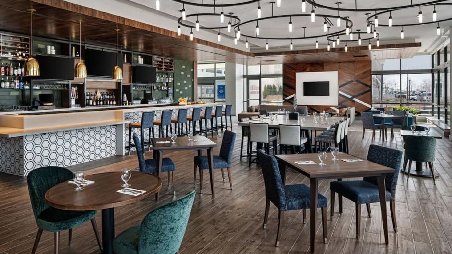 Dining area with natural light perfect for coworking at Hilton Garden Inn Camden Waterfront Philadelphia.